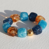 Armband Würfel goldene Kugel blau