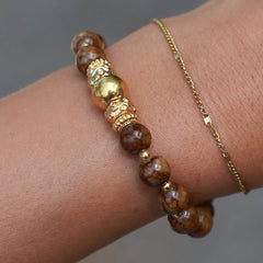 Bracelet boule dorée et pierre brune