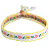 Pulsera tejida flor de algodón blanco/amarillo