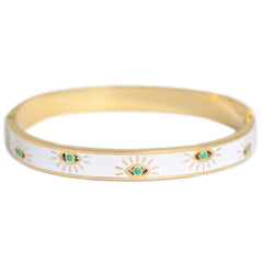 Gold bangle evil eye