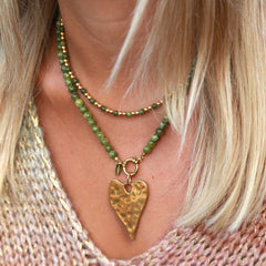 Hammered heart charm