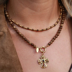 Amber cross charm