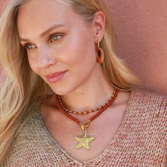 Gold star charm