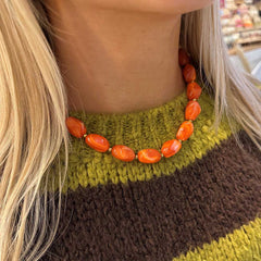 Golden necklace rocks orange