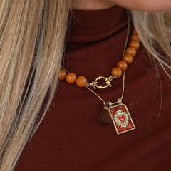 Gouden ketting tableau cognac