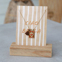 Gouden ketting tableau cognac
