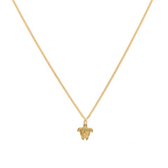 Gold necklace with turtle