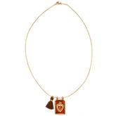 Gold necklace tableau cognac