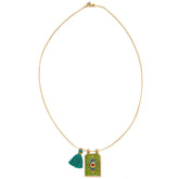 Gold necklace tableau green