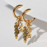 Goldene Ohrringe facettiert Liebes oliven