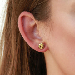 Gouden studs smiley