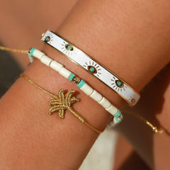 Gold bangle evil eye