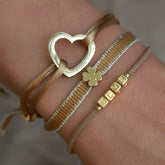 Conjunto de pulseras trébol oro