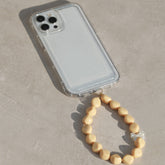 Telefonschmuck Fliege Perle beige