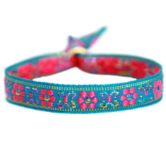 Pulsera tejida flor azul