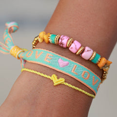 Armband hart twisted botergeel
