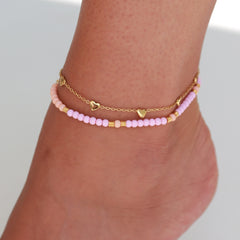Bracelet de cheville en or avec petits coeurs