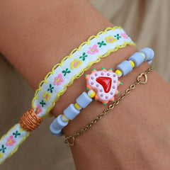 Geweven armband cotton flower wit/geel