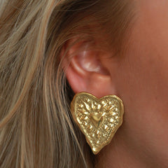 Gold statement heart earrings