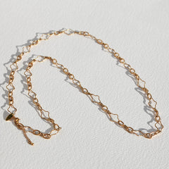 Lange goldene Kleeblattkette