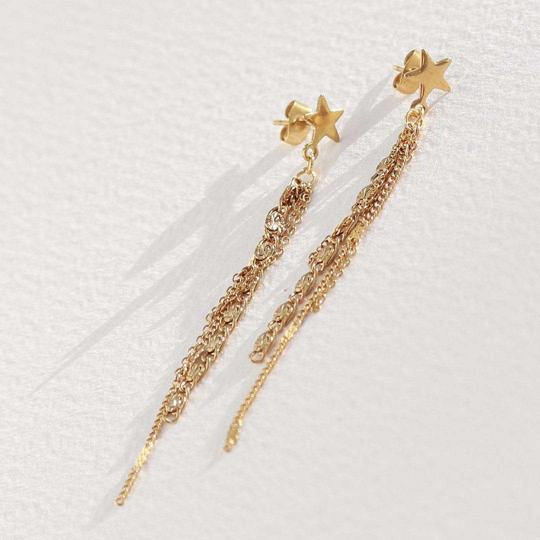 Gouden lange oorbel ster