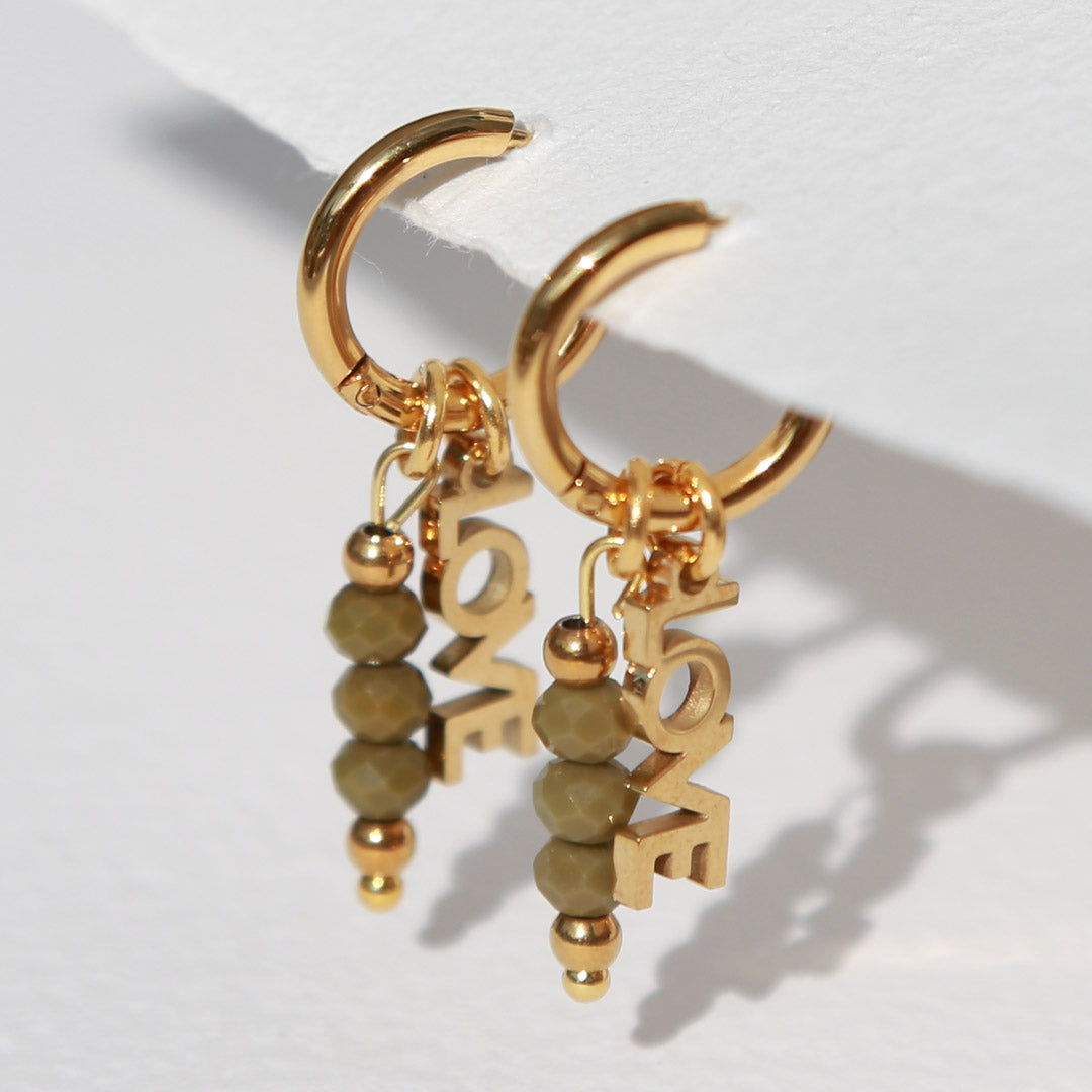 Boucles d'oreilles en or facettées forme olive