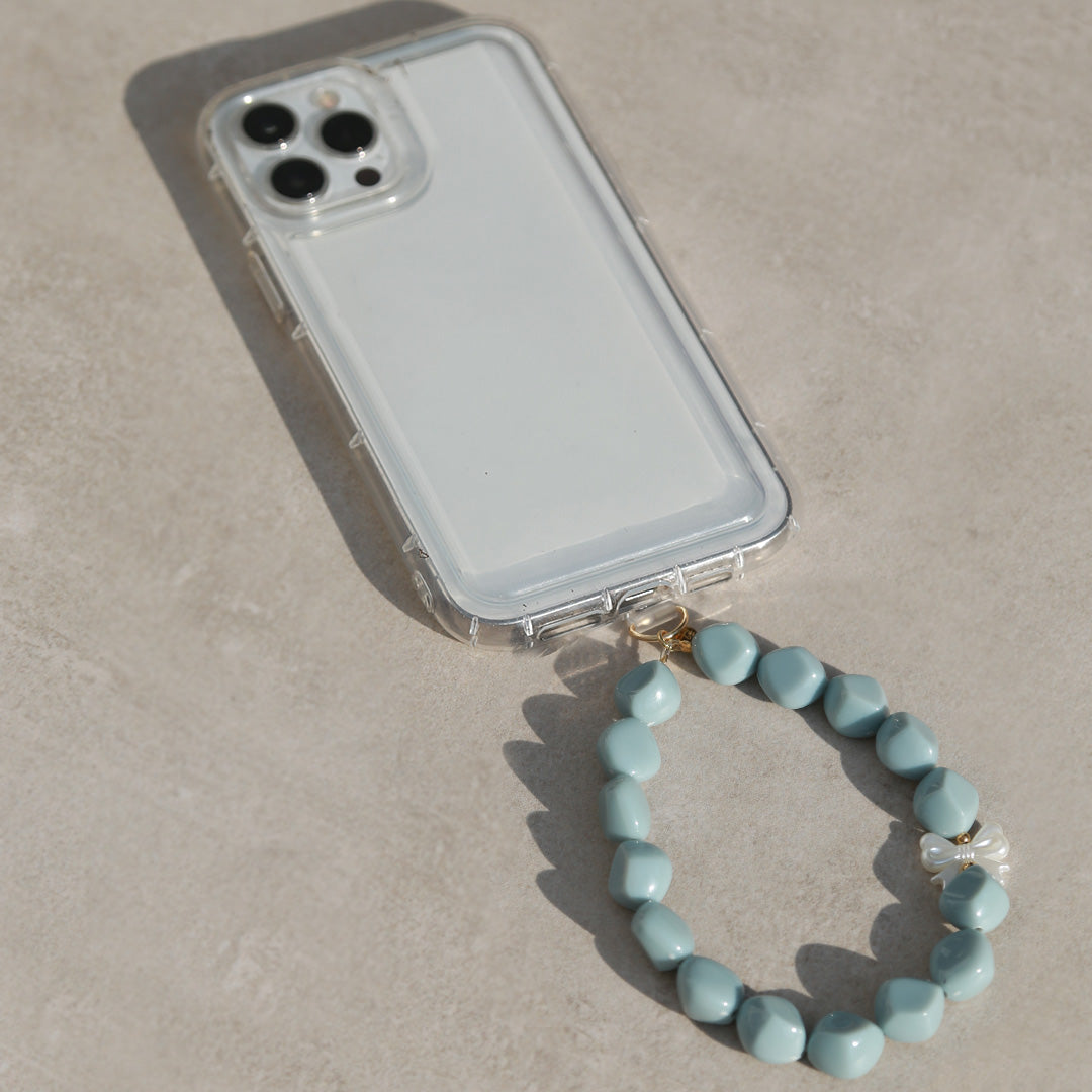 Telefonschmuck Fliege Perle blau